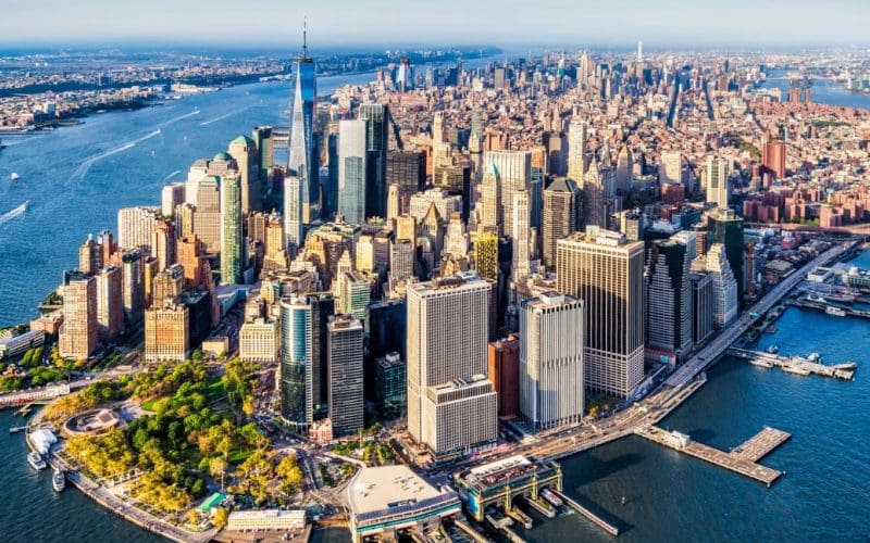 Aerial view of downtown Manhattan skyline and river.