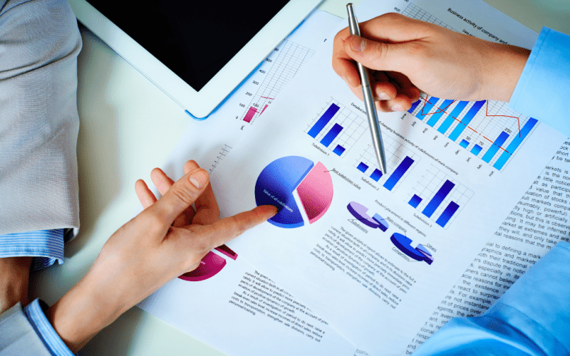 Graphs and charts analysis during a business meeting.