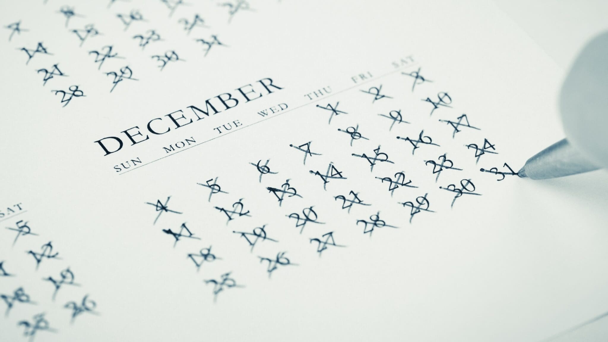 December calendar with dates crossed out.